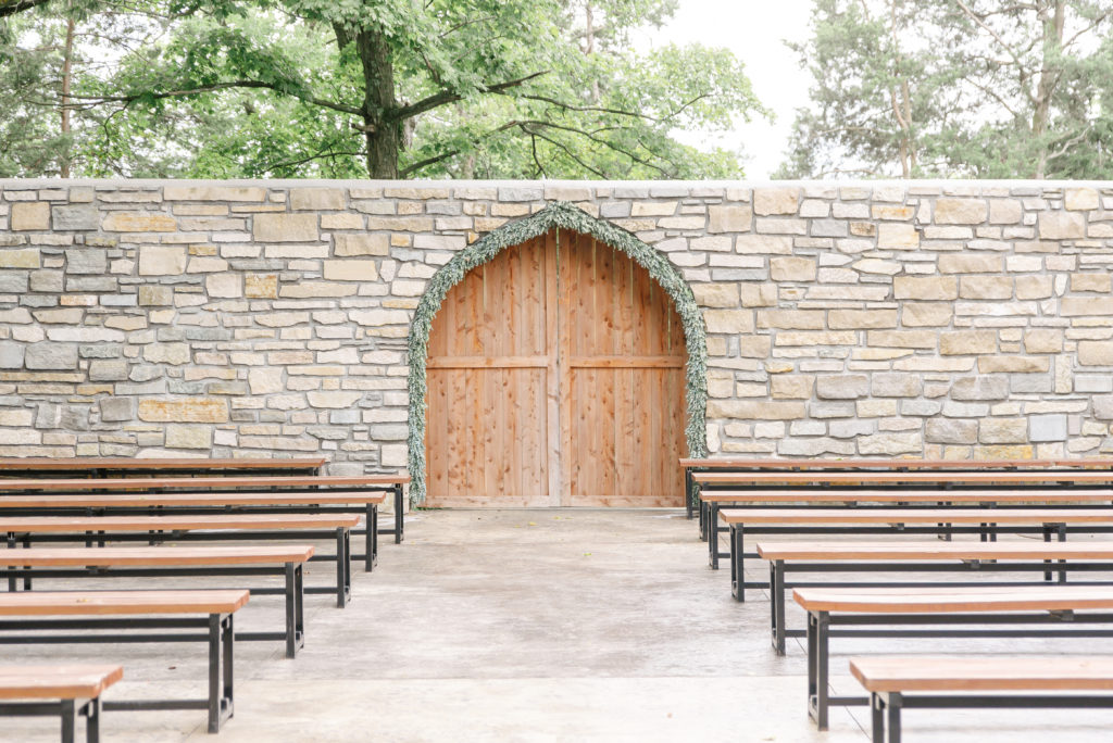 A stone archway ceremony site at Haue Valley wedding venue in Pacific, Missouri.